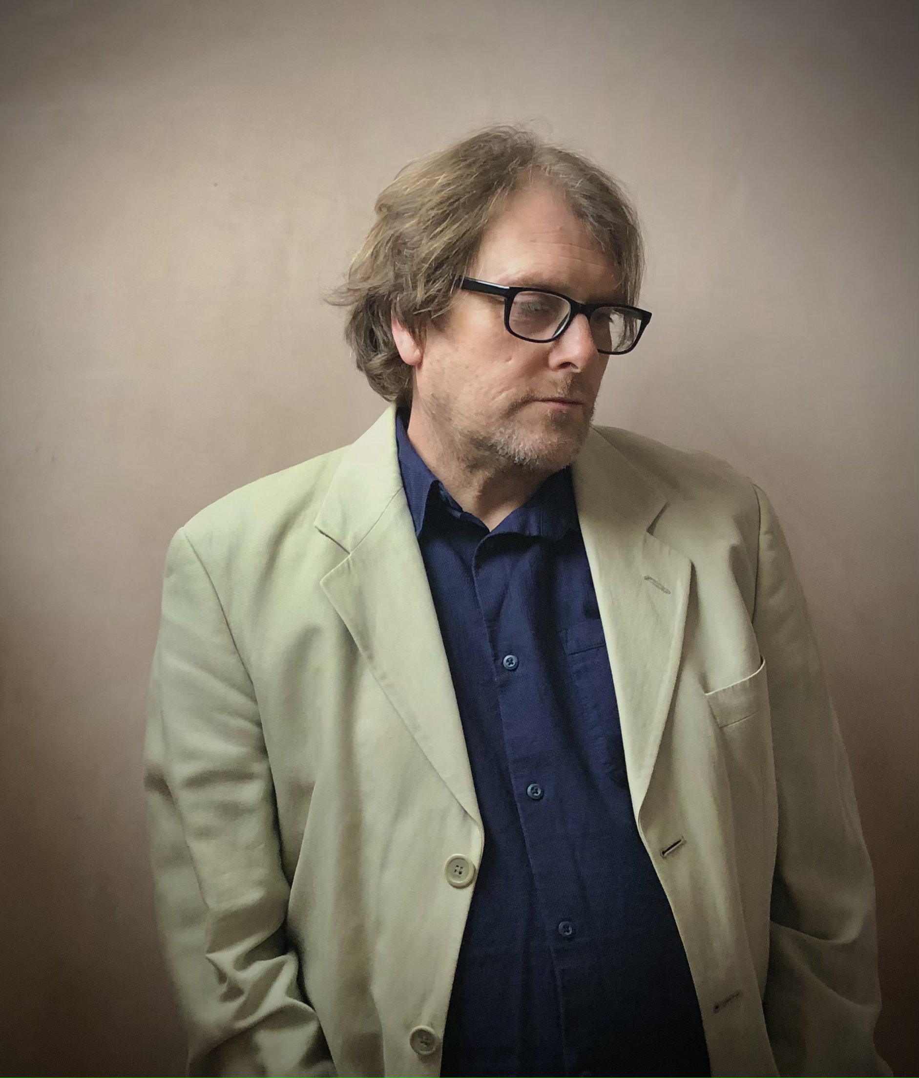A photograph of Giles Booth taken by his daughter during one of the coronavirus lockdowns - hence the hair