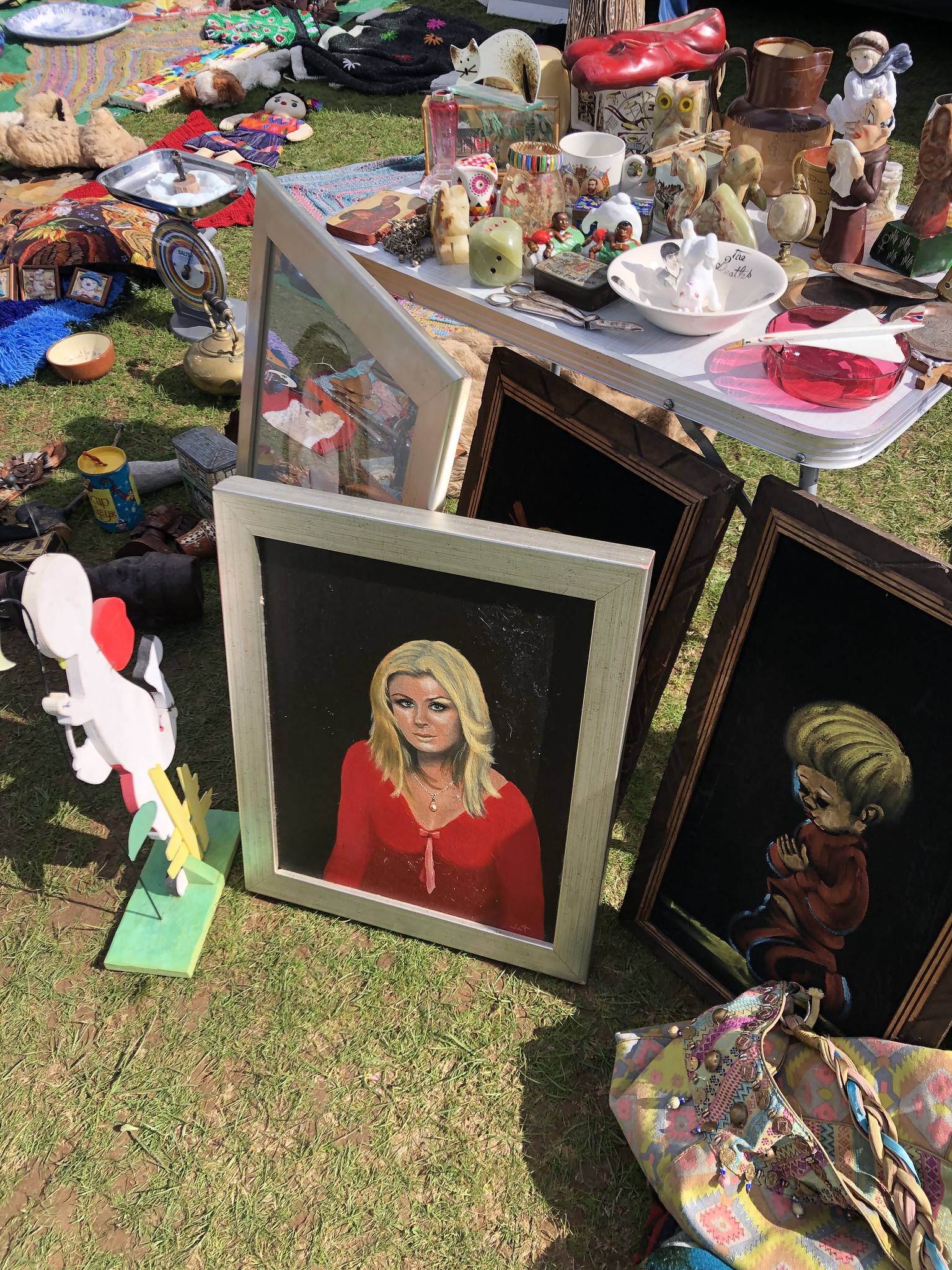 Scary paintings at a car boot fair